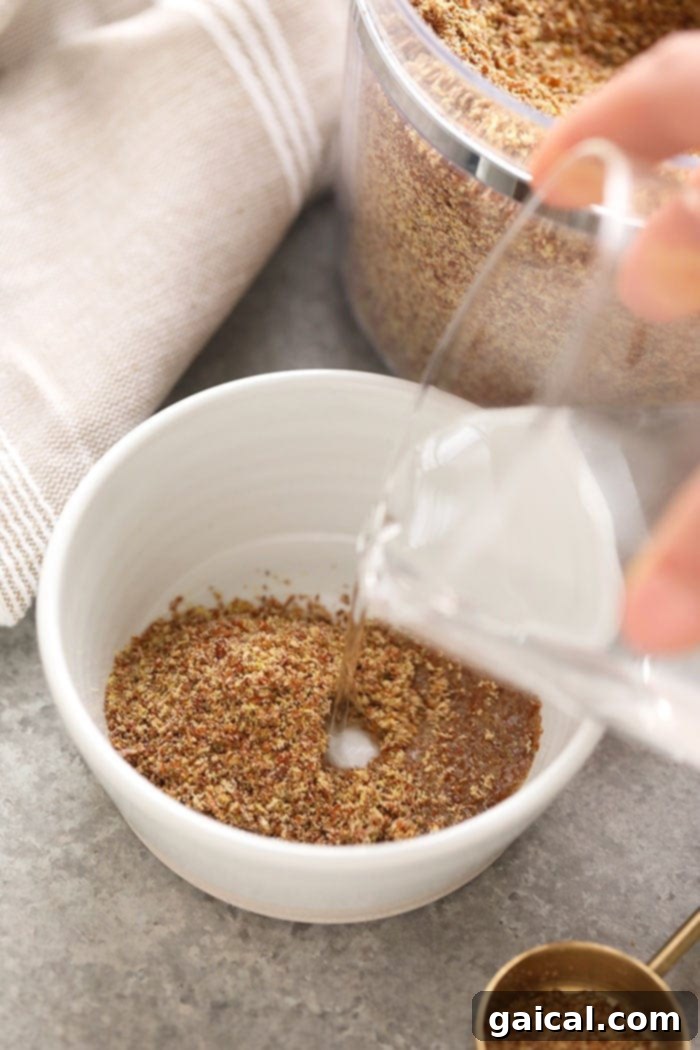 A beautifully prepared flax egg in a small white bowl, ready to be incorporated into a baking recipe, showcasing its gelatinous texture.