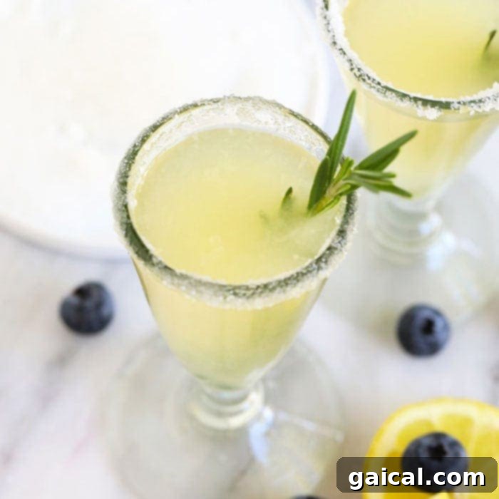 Over 15 Incredible Vodka Cocktail Recipes 6 A classic Lemon Drop Martini in a stemmed glass, garnished with a lemon twist, exuding elegance and refreshing taste.