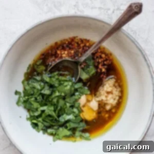 Shrimp Infusion Perfection 4 A bowl of vibrant grilled shrimp marinade, freshly mixed.