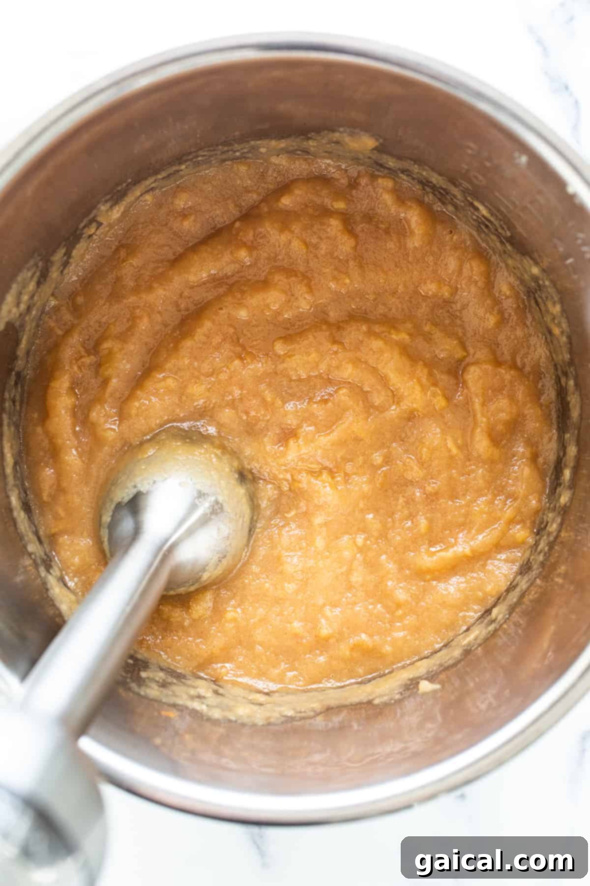 Easy Homemade Instant Pot Applesauce 5 Five jars of freshly made homemade applesauce, showcasing beautiful consistency and color, ready for storage.