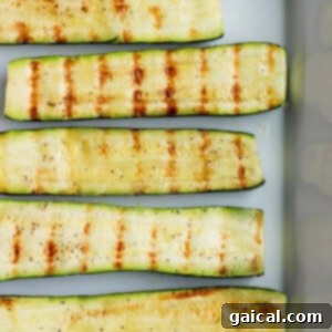 Smoky Zucchini Perfection 2 grilled zucchini on platter.