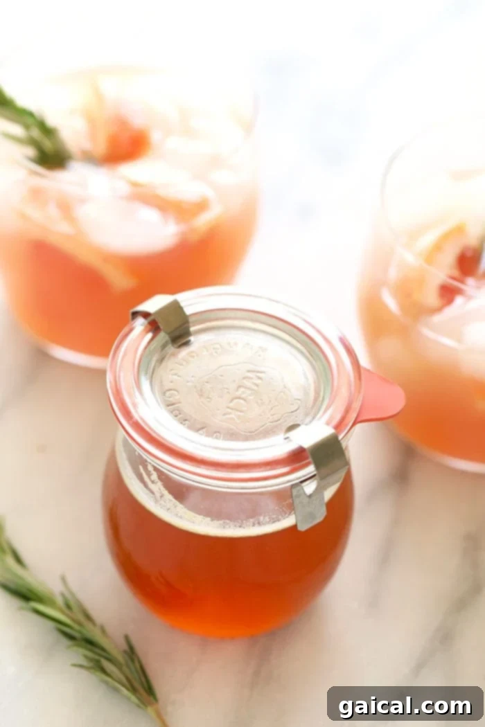 Homemade Honey Simple Syrup: A versatile natural sweetener for all your culinary needs. A jar of homemade honey simple syrup ready for use, highlighting its golden hue.