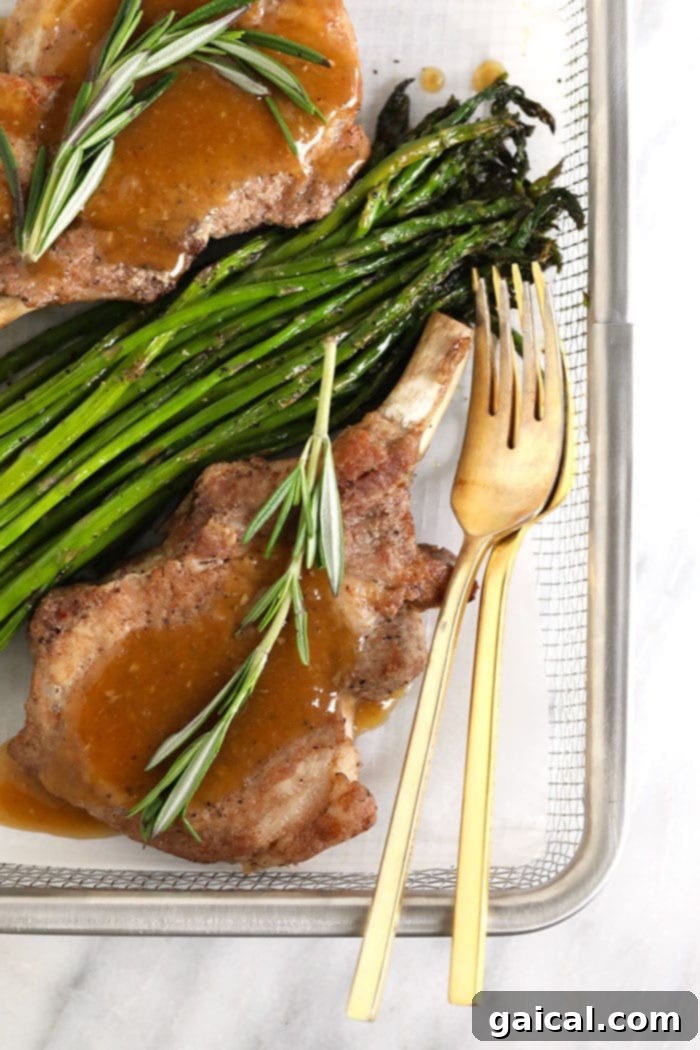 Juicy Instant Pot Pork Chops with Whiskey Gravy and Asparagus