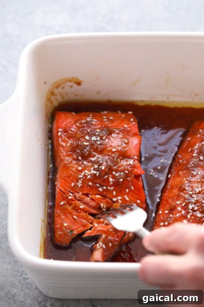 Flaky Maple Ginger Baked Salmon maple ginger baked salmon fillets, perfectly cooked with a caramelized glaze