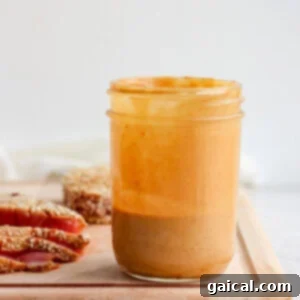 A jar of peanut butter in ahi poke bowl.