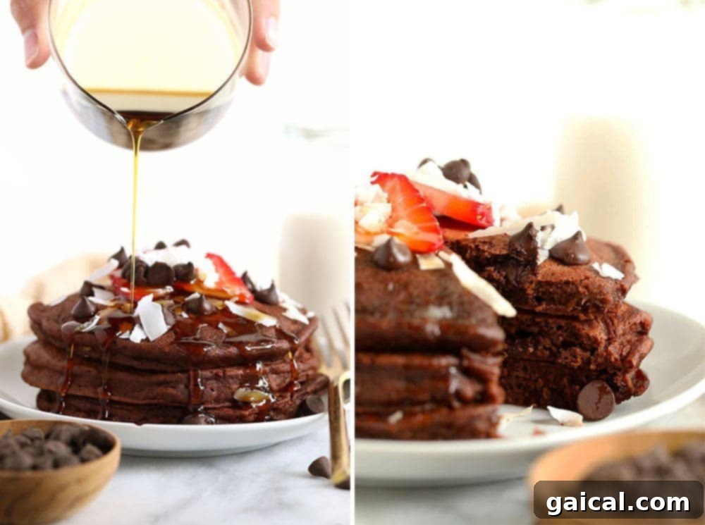 Decadent Chocolate Chocolate Chip Pancakes generously topped with extra chocolate chips and syrup.