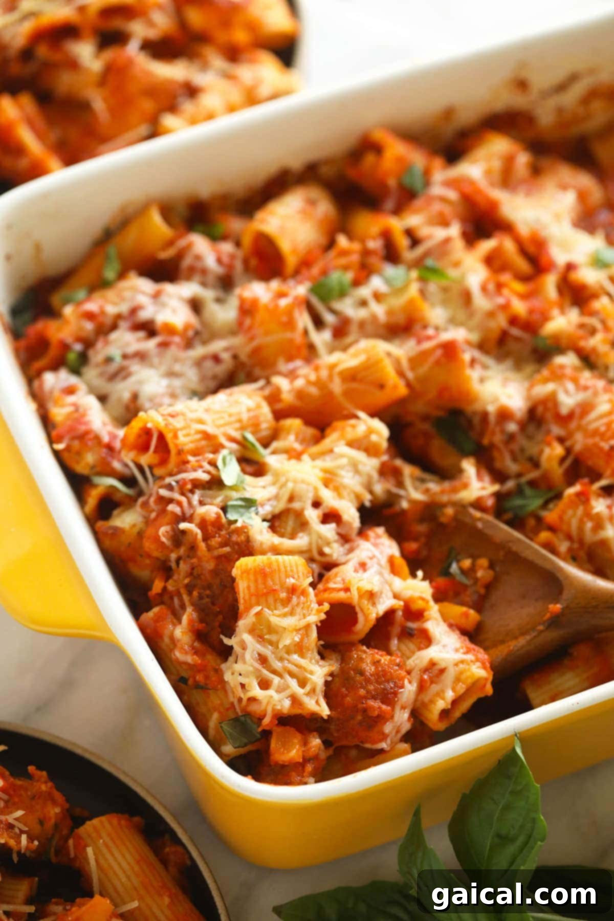 Say hello to the most delicious chicken parmesan casserole. This pasta casserole has crispy chicken, savory marinara sauce, and lots of CHEESE. It is the perfect family dinner that everyone will love! Chicken parmesan in a casserole dish