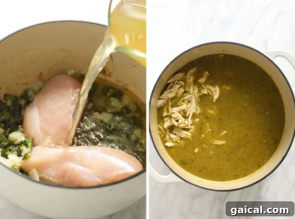 Simmering Pot of Chicken Green Chili A large stockpot filled with simmering green chicken chili, steam rising invitingly.