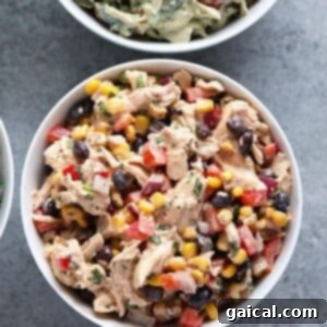 The Southwest Chicken Salad fully mixed with its creamy dressing in a bowl, showcasing its readiness for serving.