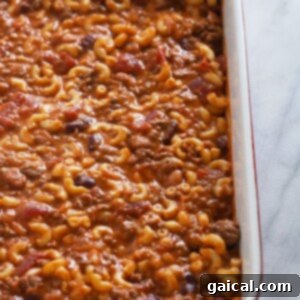 A delicious chili mac recipe baking in a casserole dish.