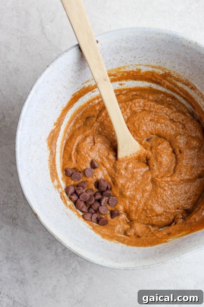 Preparing the dry ingredients for our wholesome pumpkin bread. All the dry ingredients for healthy pumpkin bread neatly arranged in a bowl.