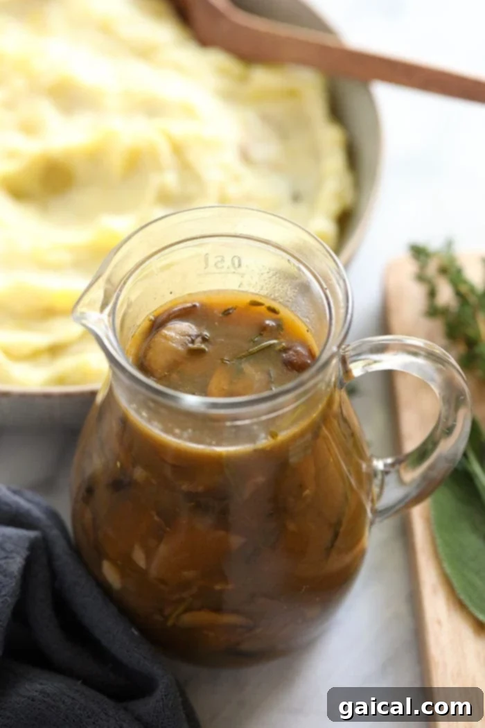 Mushroom gravy in a pour jar.