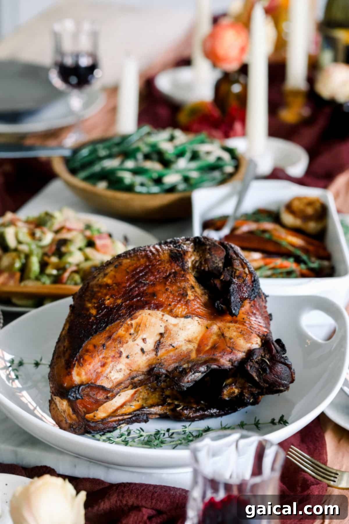 Flawless Festive Turkey 2 A beautifully cooked sous vide turkey breast, expertly sliced and arranged on a serving platter, surrounded by vibrant roasted vegetables and a rich, golden gravy, ready for a festive holiday meal.
