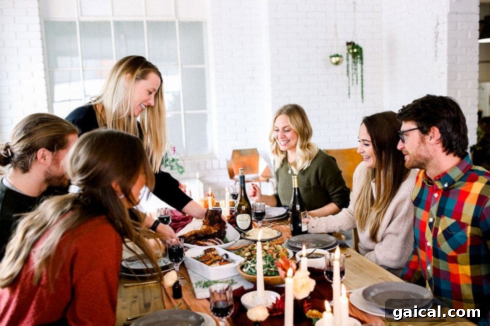 Friendsgiving table spread with delicious food and festive decorations
