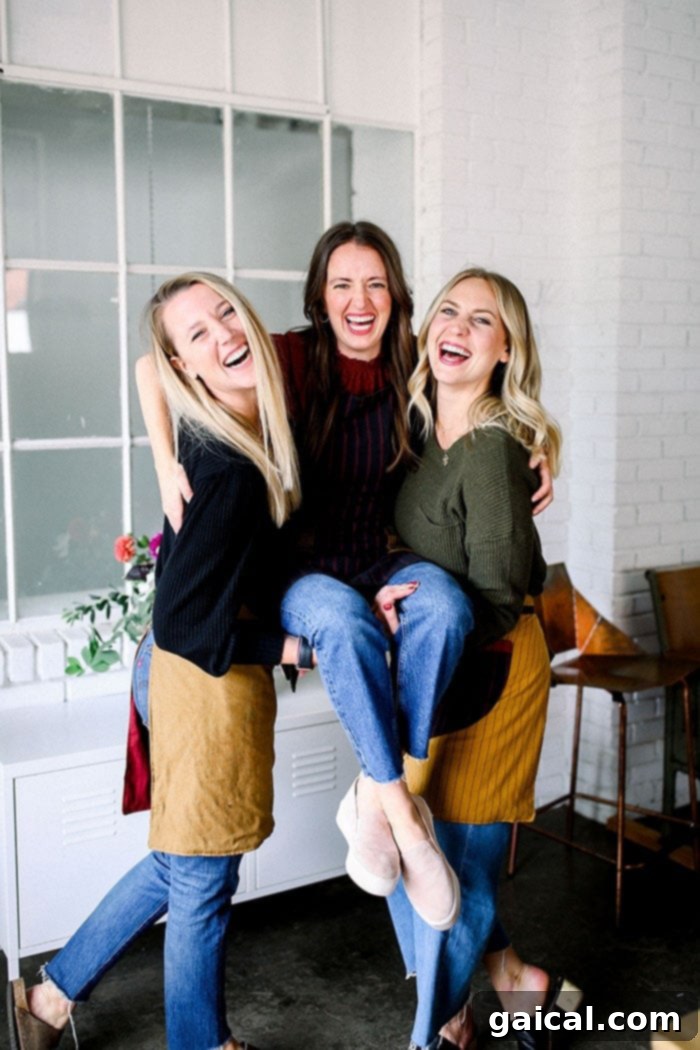team fit foodie laughing at Friendsgiving table