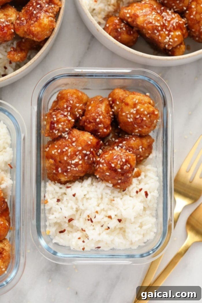 General Tso's Cauliflower in a meal prep container with rice.