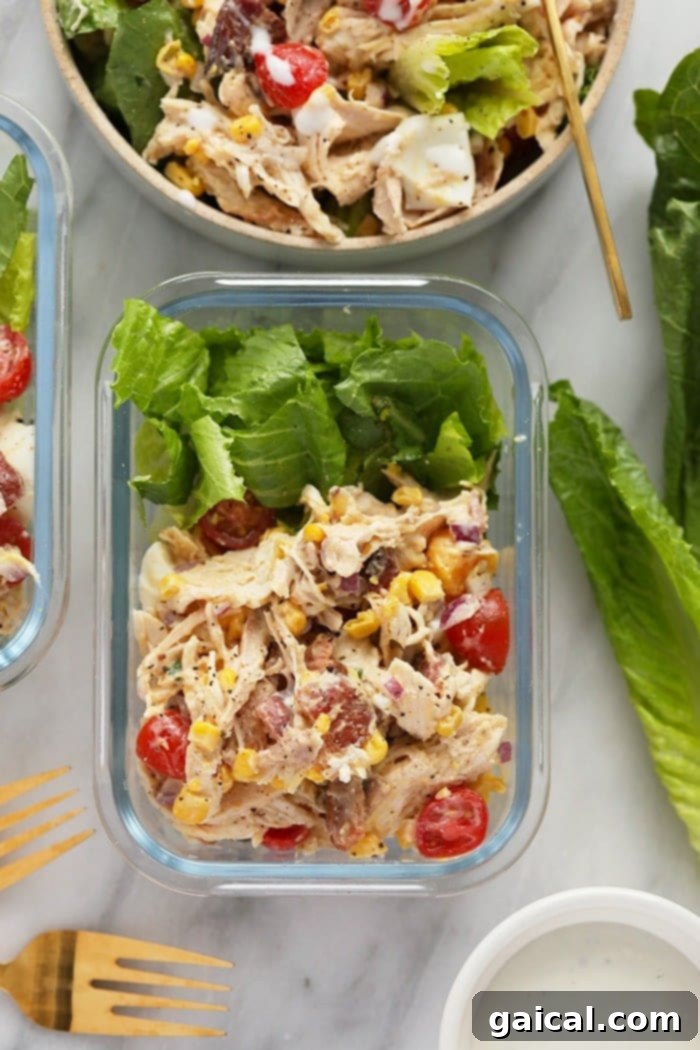 Rotisserie Chicken Cobb salad neatly arranged in a meal prep container.