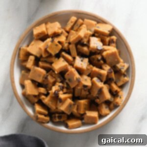 Plant-Based Cookie Dough Treats 2 Peanut butter fudge with cookie dough bites in a bowl, a close-up.