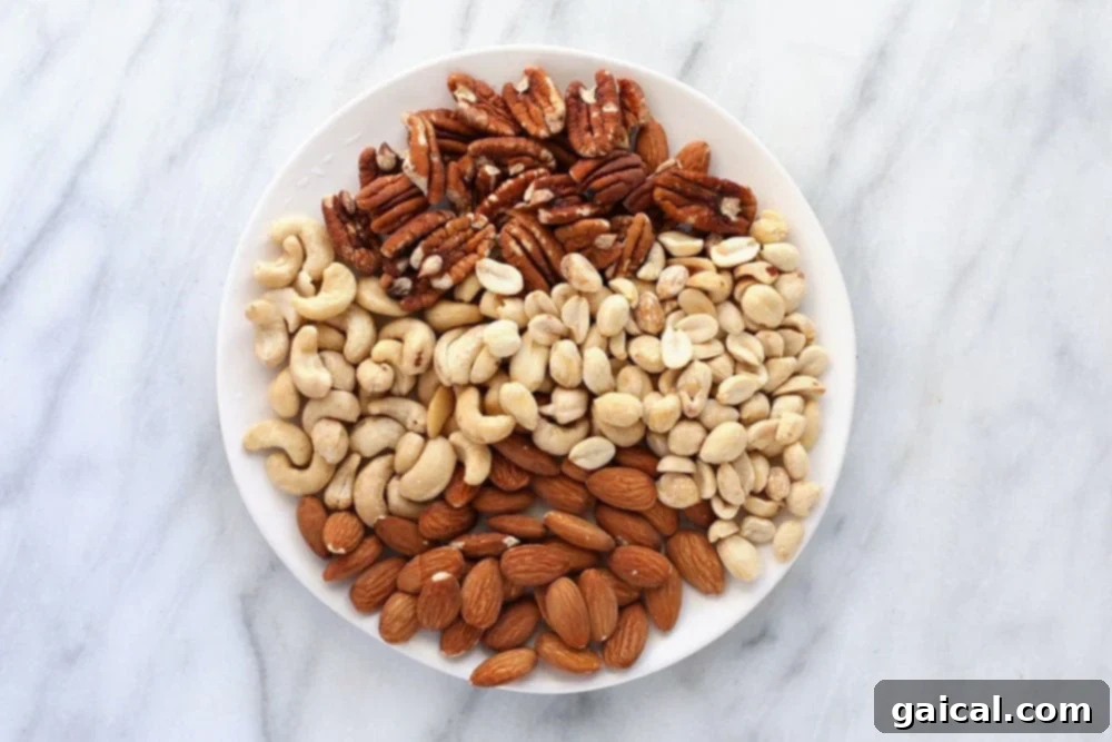 A rustic plate filled with an assortment of healthy nuts, including almonds, walnuts, and cashews.