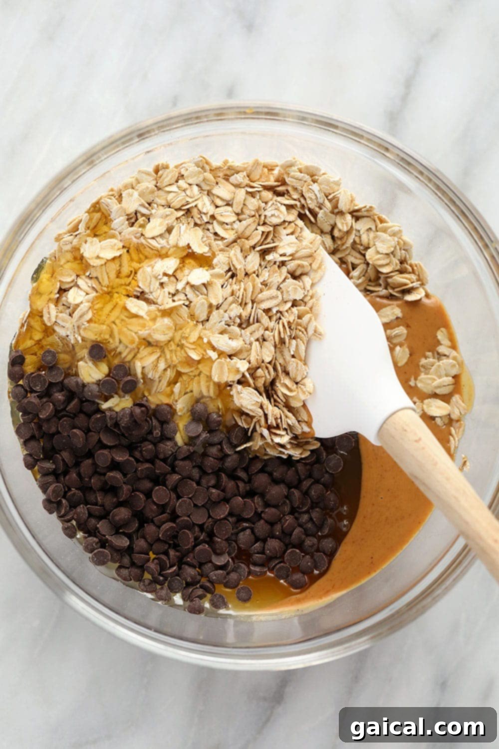 No-Bake Chocolate Oatmeal Cookie Ingredients in a Bowl A bowl filled with the mixed ingredients for no-bake chocolate oatmeal cookies, ready to be formed.