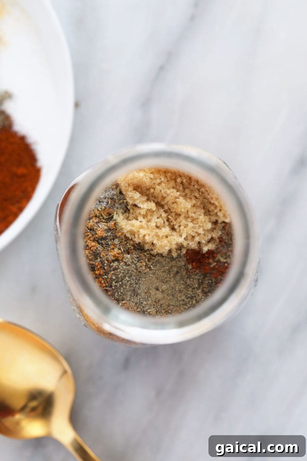 DIY Cajun Spice Blend 5 Homemade Cajun seasoning in a glass jar, perfectly blended