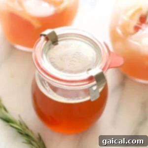 Crimson Zest Margarita 2 Honey simple syrup in a glass jar.