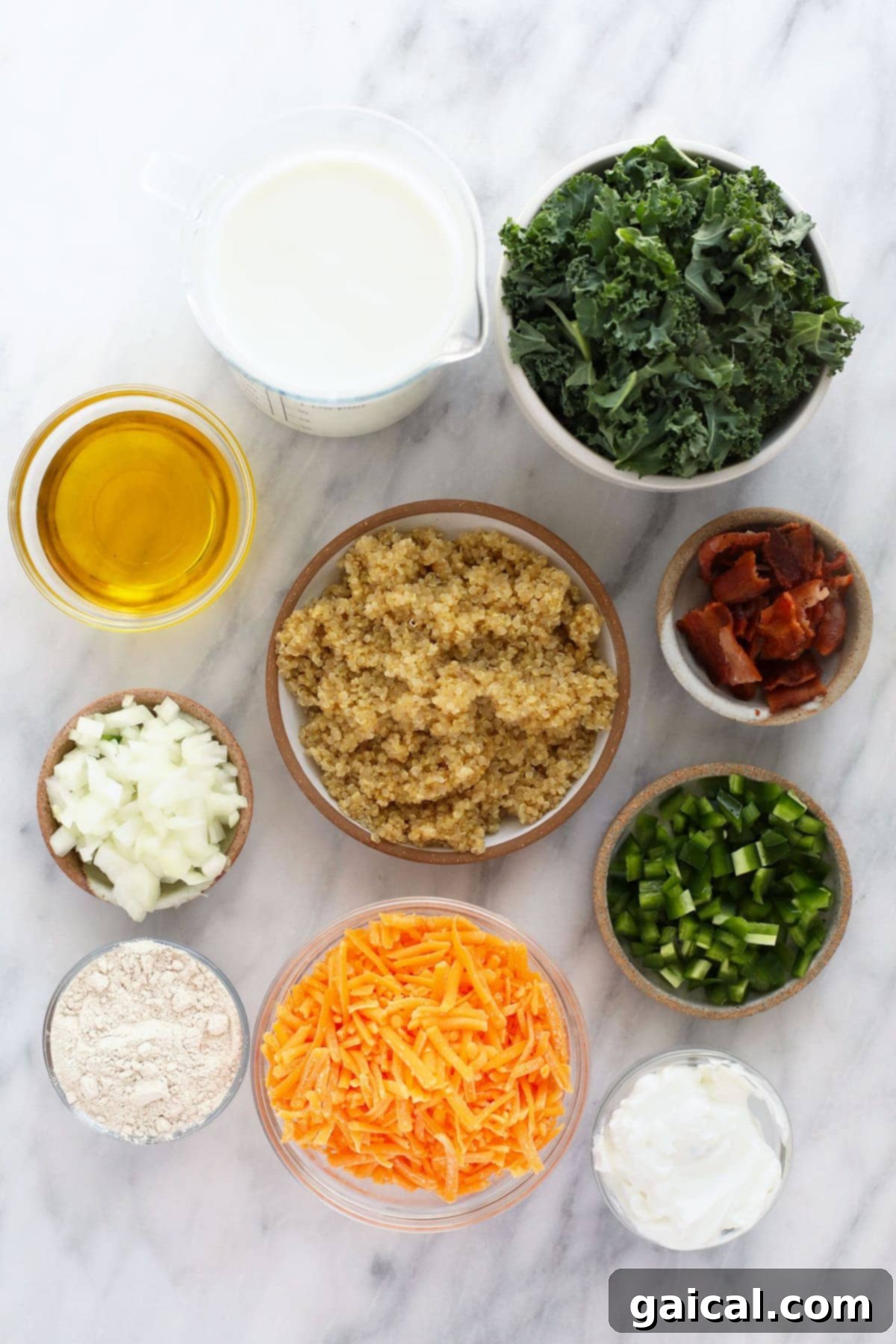 Wholesome Quinoa Mac 4 All the fresh ingredients for Jalapeño Bacon Quinoa Mac and Cheese, including quinoa, kale, cheese, and aromatics, neatly arranged and ready for preparation.