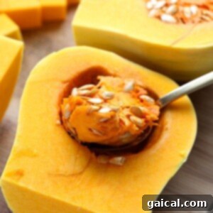 Cleaning out butternut squash.