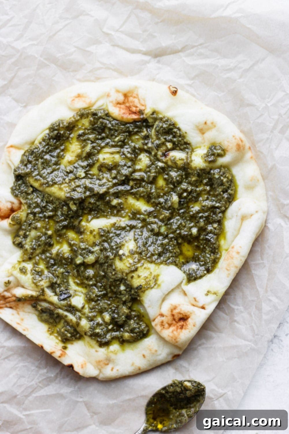 Naan Breakfast Bake 4 Naan pizza base generously topped with vibrant pesto.