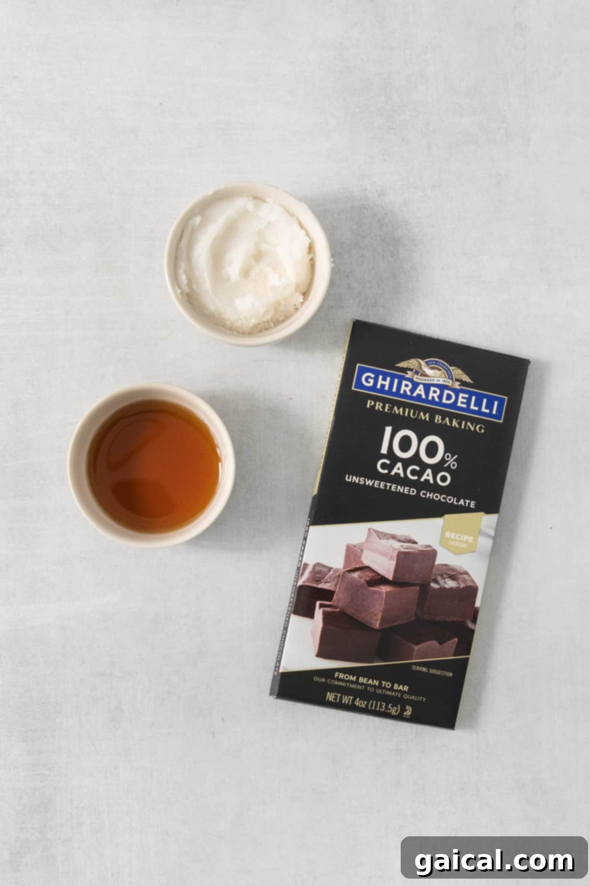 Quick & Easy Homemade Vegan Chocolate Chips 3 A bar of chocolate next to a bowl of tea.