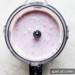 Blueberry cheesecake filling after blending, showing its smooth texture and rich color.