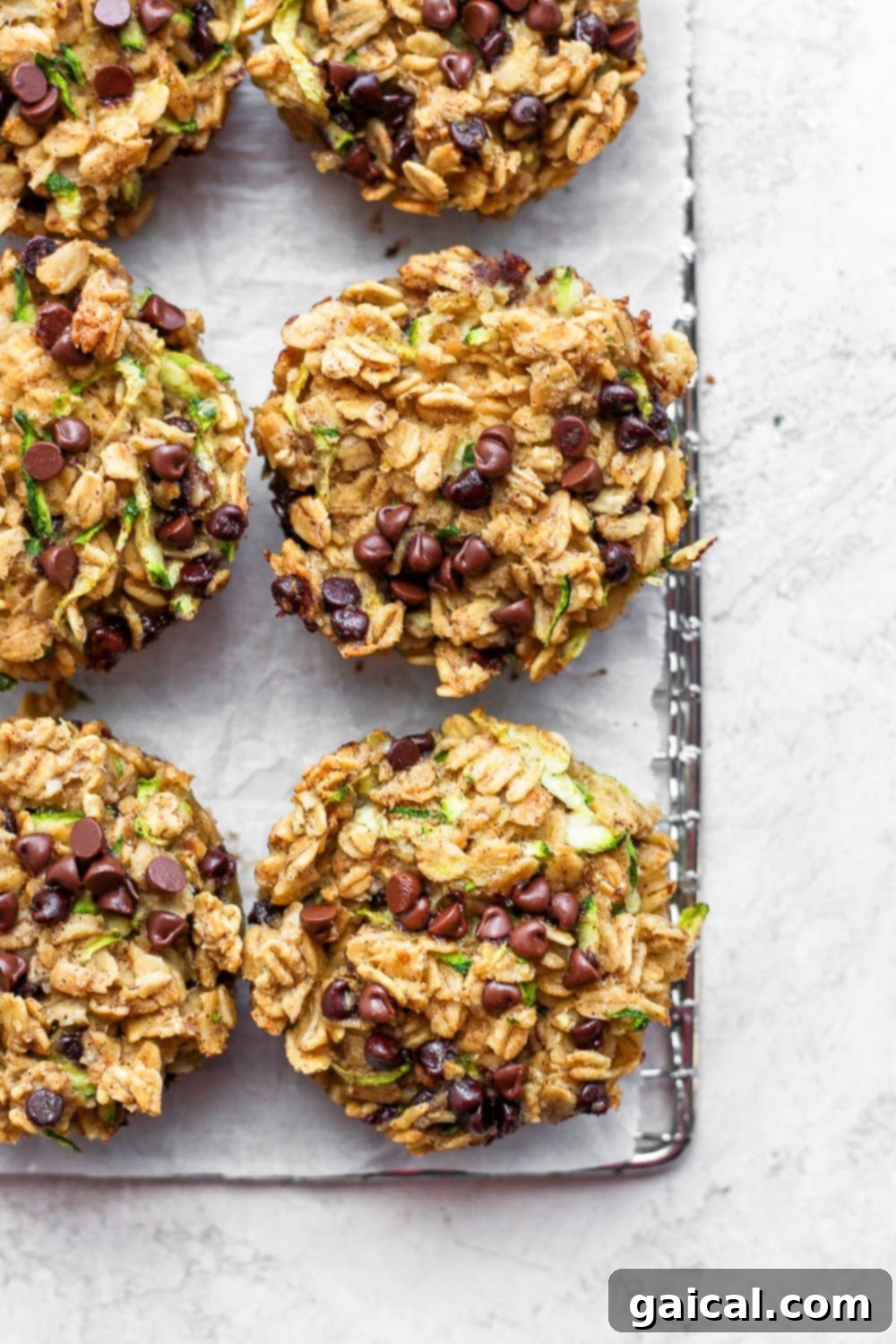 Zucchini oatmeal cups on a cooling rack. 