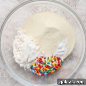 Protein-Packed Sugar Cookie Bites 7 Dry ingredients in a bowl
