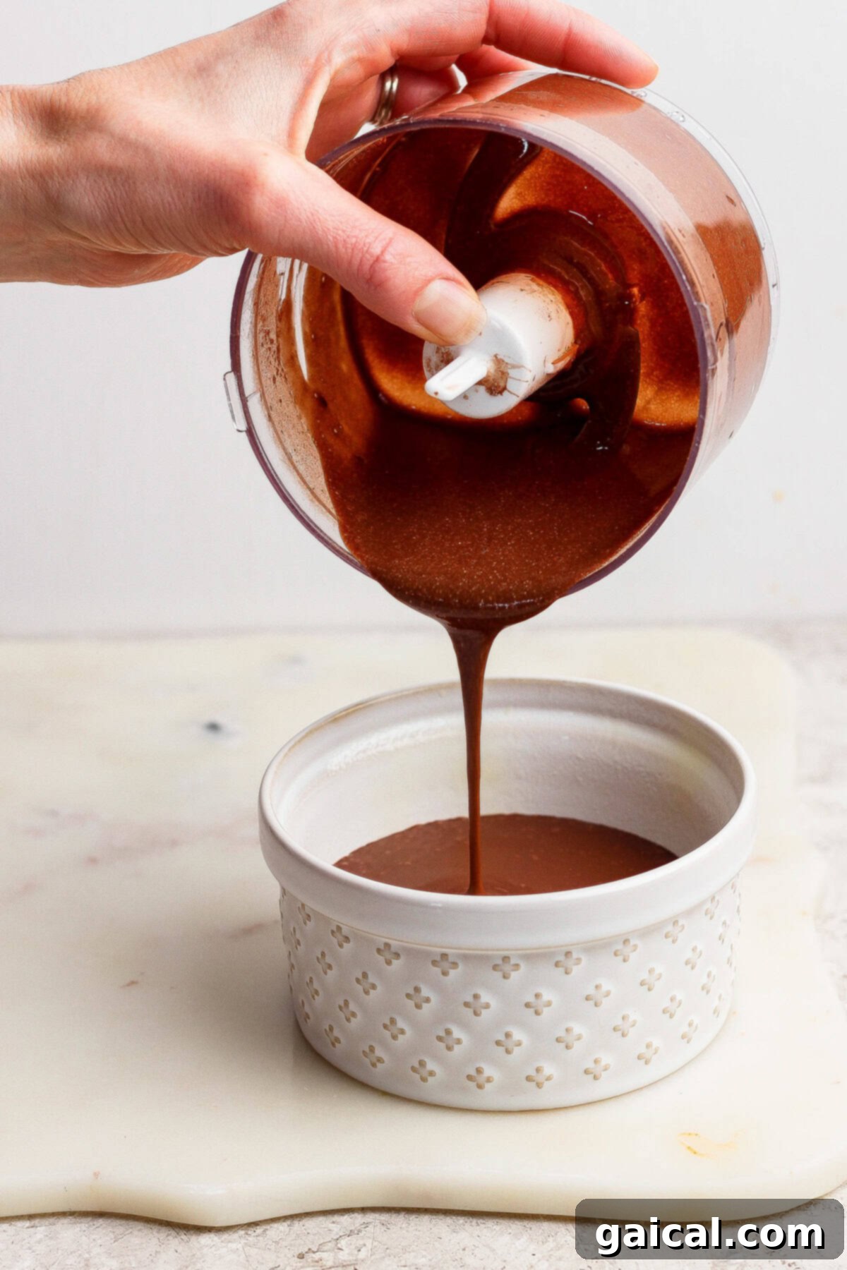 Cottage Cheese Chocolate Delight 5 Pouring batter into ramekin