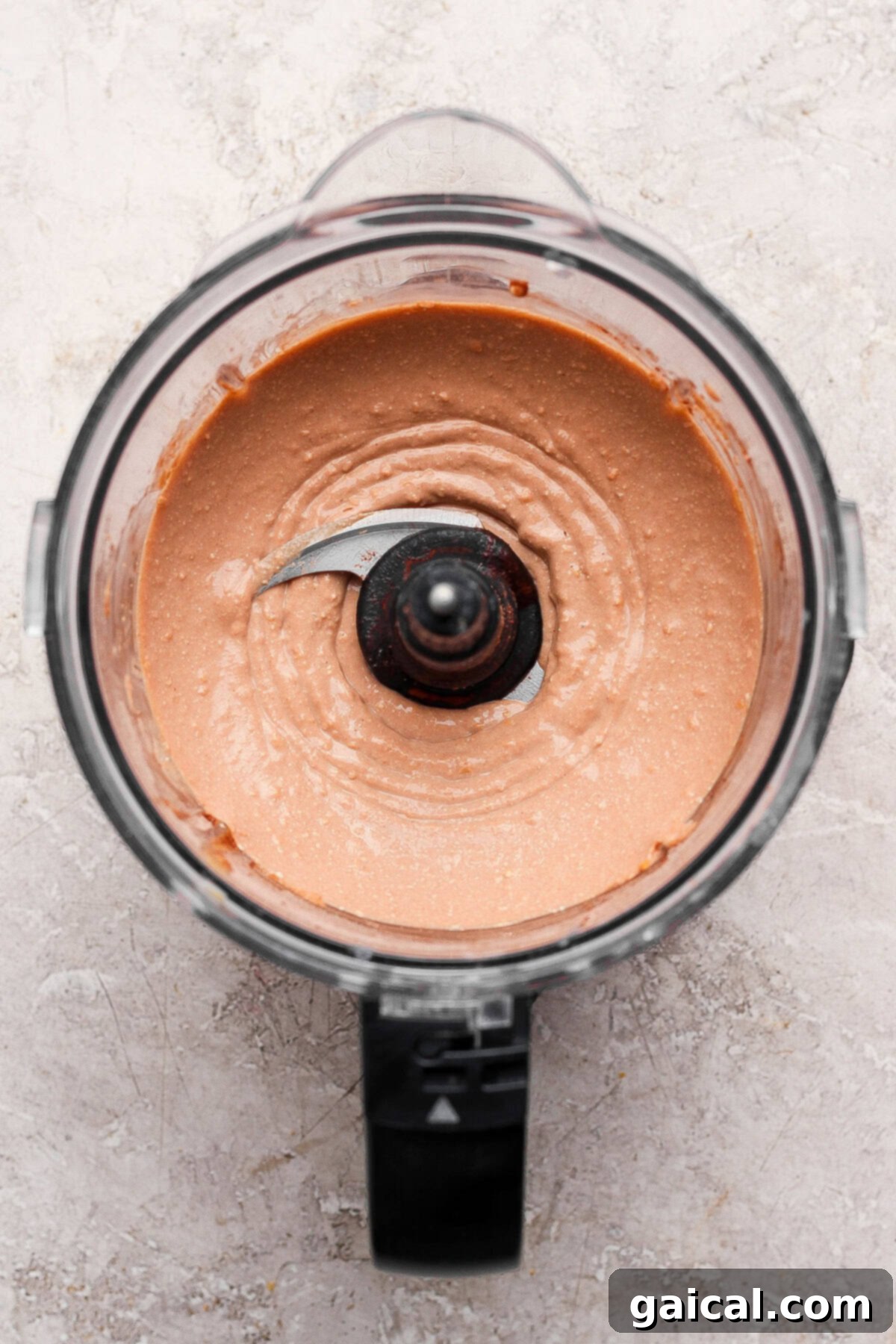 No-Bake Cottage Cheese Dream Bars 5 Smooth cheesecake layer mixture in a food processor.