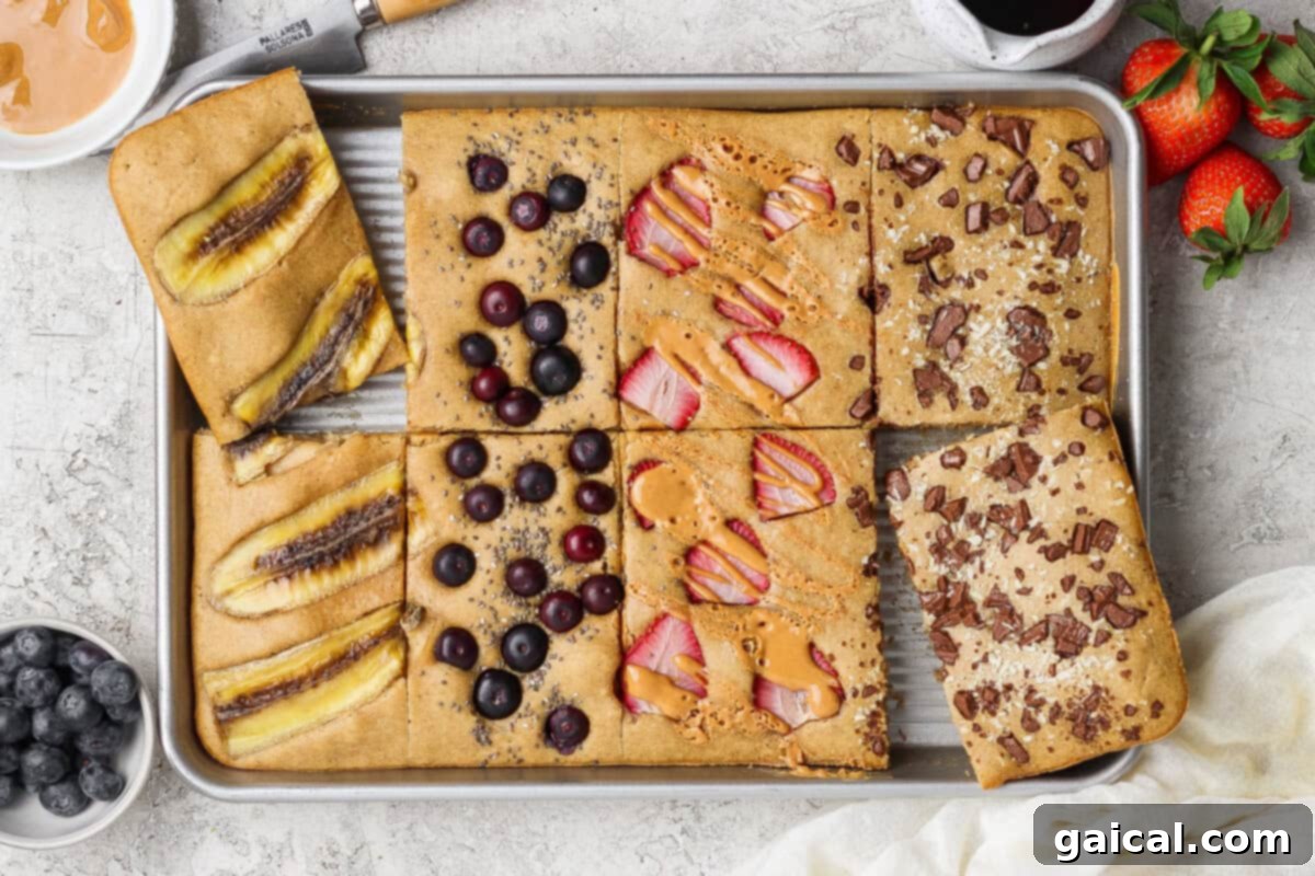 Sheet pan protein pancakes with various toppings