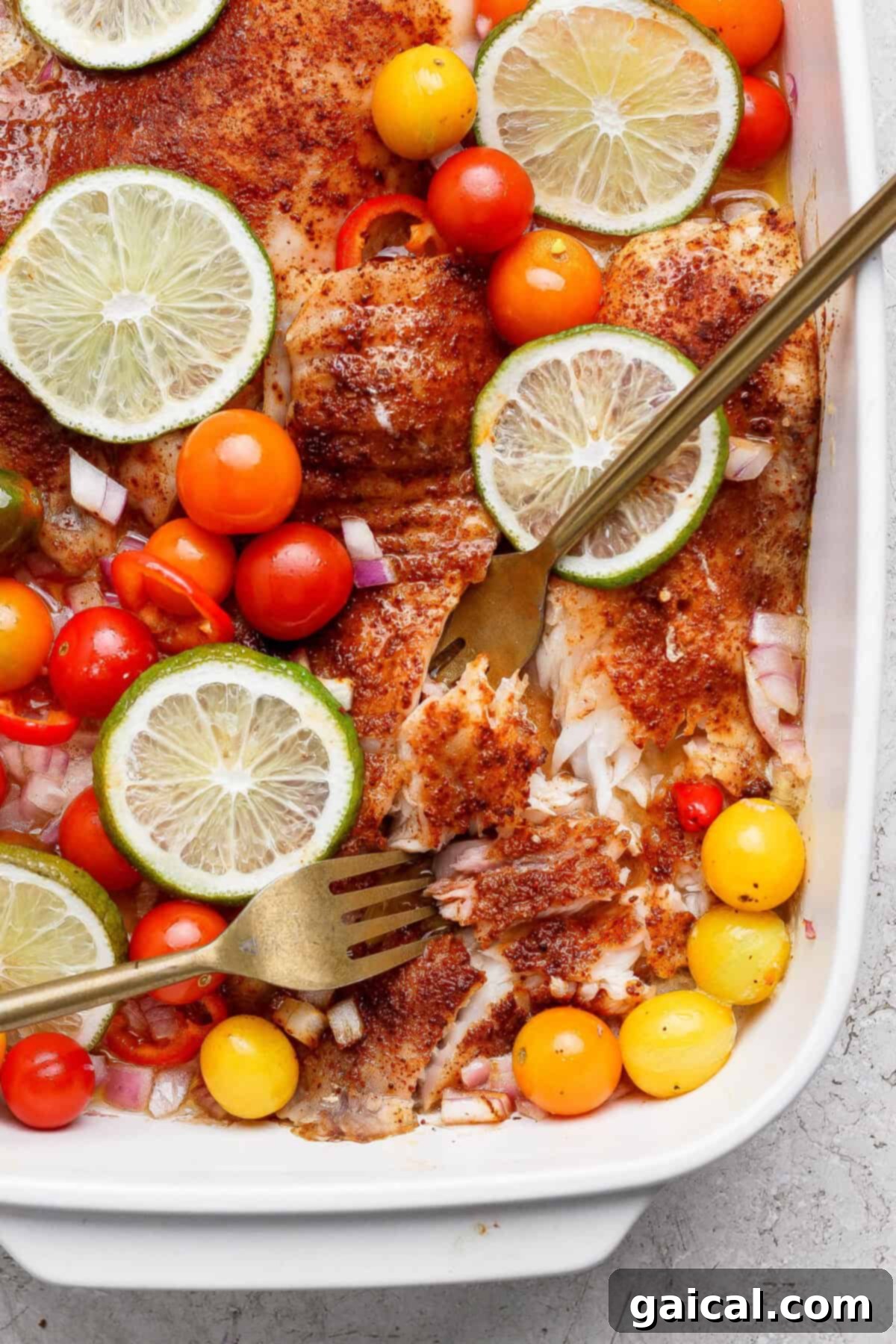 Baked fish fillets with lime and vegetables.