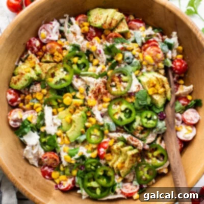 Next Level Street Corn Creations 8 A bowl of creamy street corn chicken salad, perfect for sandwiches or wraps.