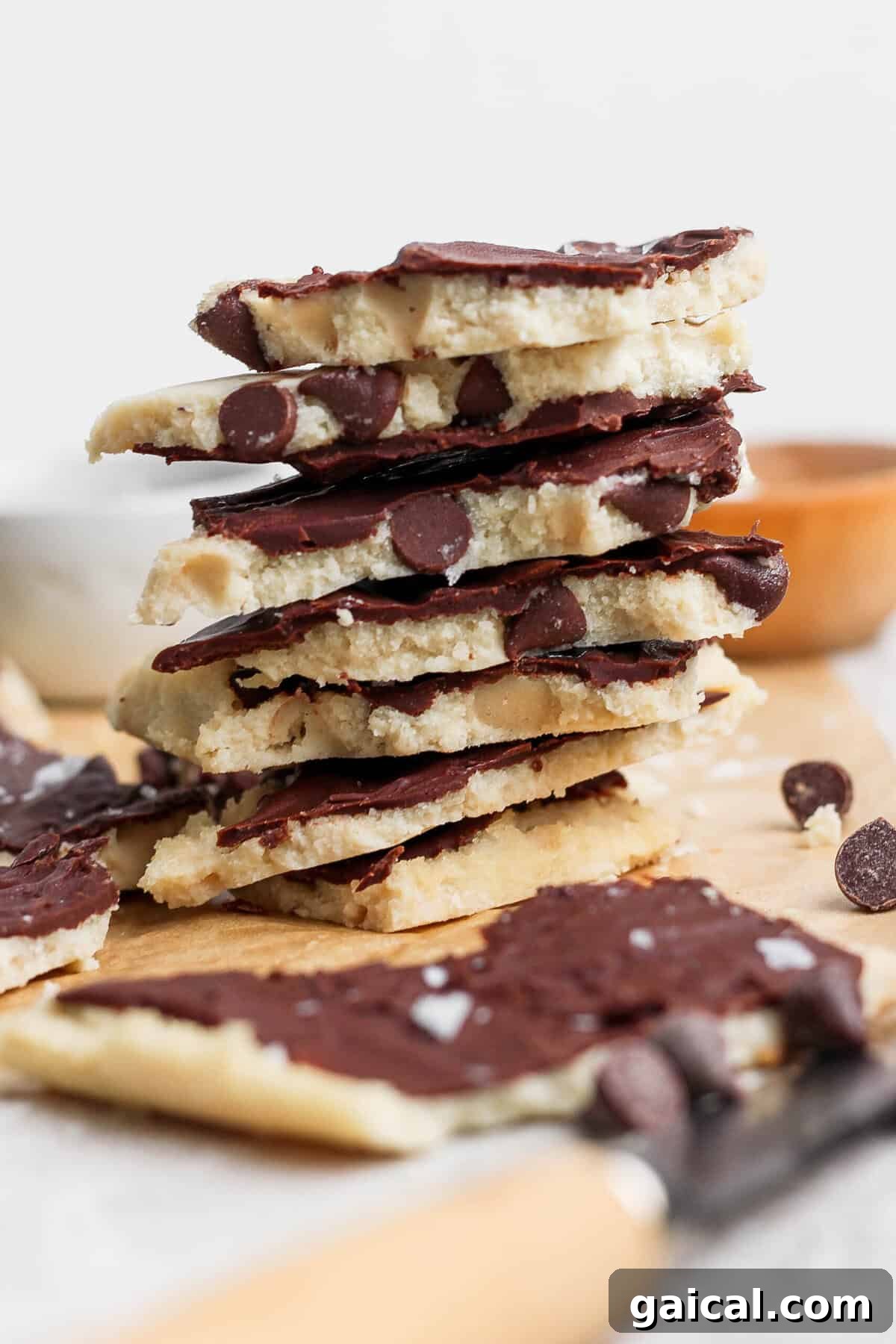 cottage cheese cookie dough bark stacked to show layers of dough and chocolate