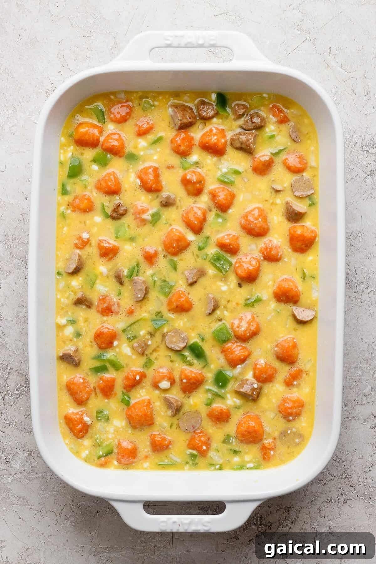 sweet potato breakfast casserole mixed together and ready to bake