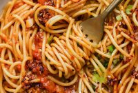 Chili Crunch Pasta with Rustic Smashed Tomato Sauce